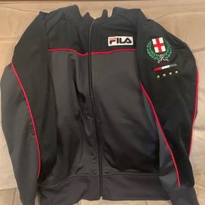 FILA zip up jacket with pockets, no hood.
